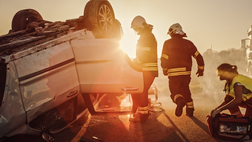 First responders at the scene of a rollover collision